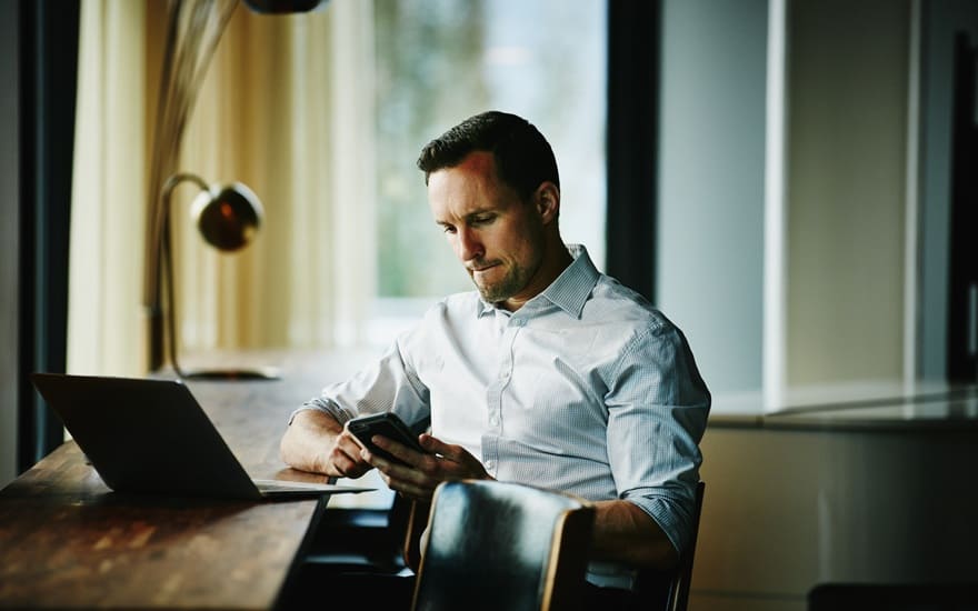 How do you activate your eSIM profile on an iPhone?